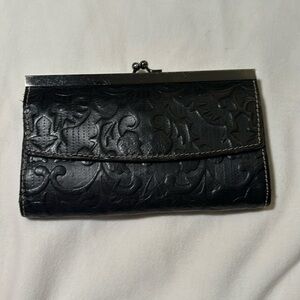 Large tooled leather wallet